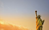 statue of liberty at night time